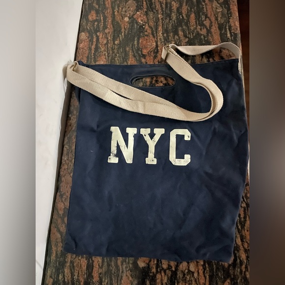 Handbags - NYC canvas tote bag with adjustable strap. Medium size. Used gently
